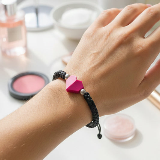 TINY LOVE. PULSERA CON CORAZON ROSA Y CORDON TRENZADO NEGRO