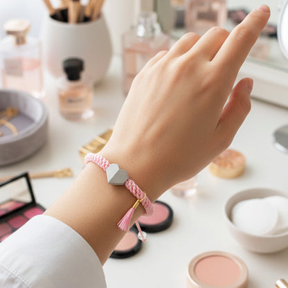 TINY LOVE. PULSERA CON CORAZON Y CORDON TRENZADO ROSA PASTEL