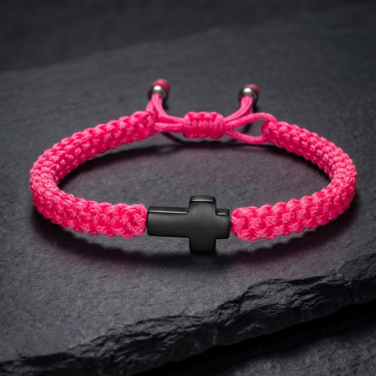 CRUZ. PULSERA TRENZADA ROSA NEON CON CRUZ NEGRA