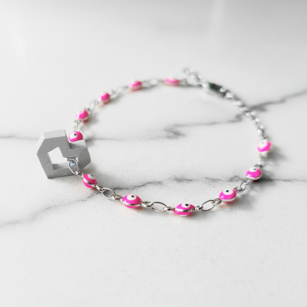 PULSERA CORAZON Y CADENA DE OJOS ROSA