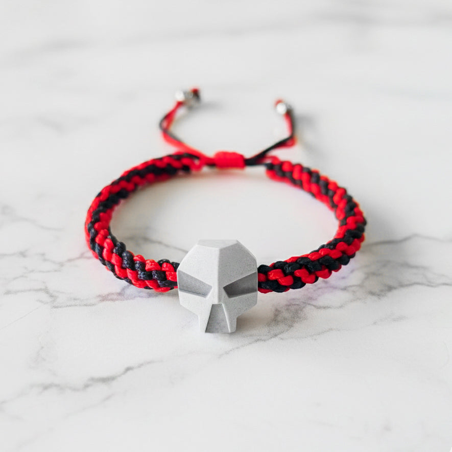 SKULL. PULSERA CALAVERA CORDON TRENZADO ROJO