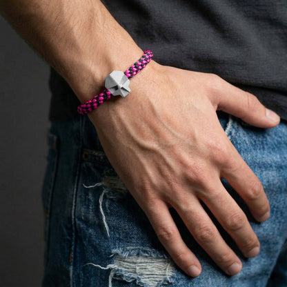 SKULL. PULSERA CALAVERA CORDON TRENZADO ROSA NEON