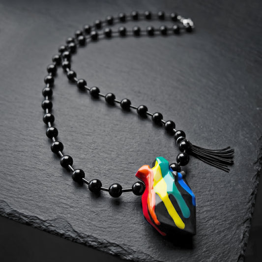 COLLAR ONIX CON CORAZON ARCOIRIS